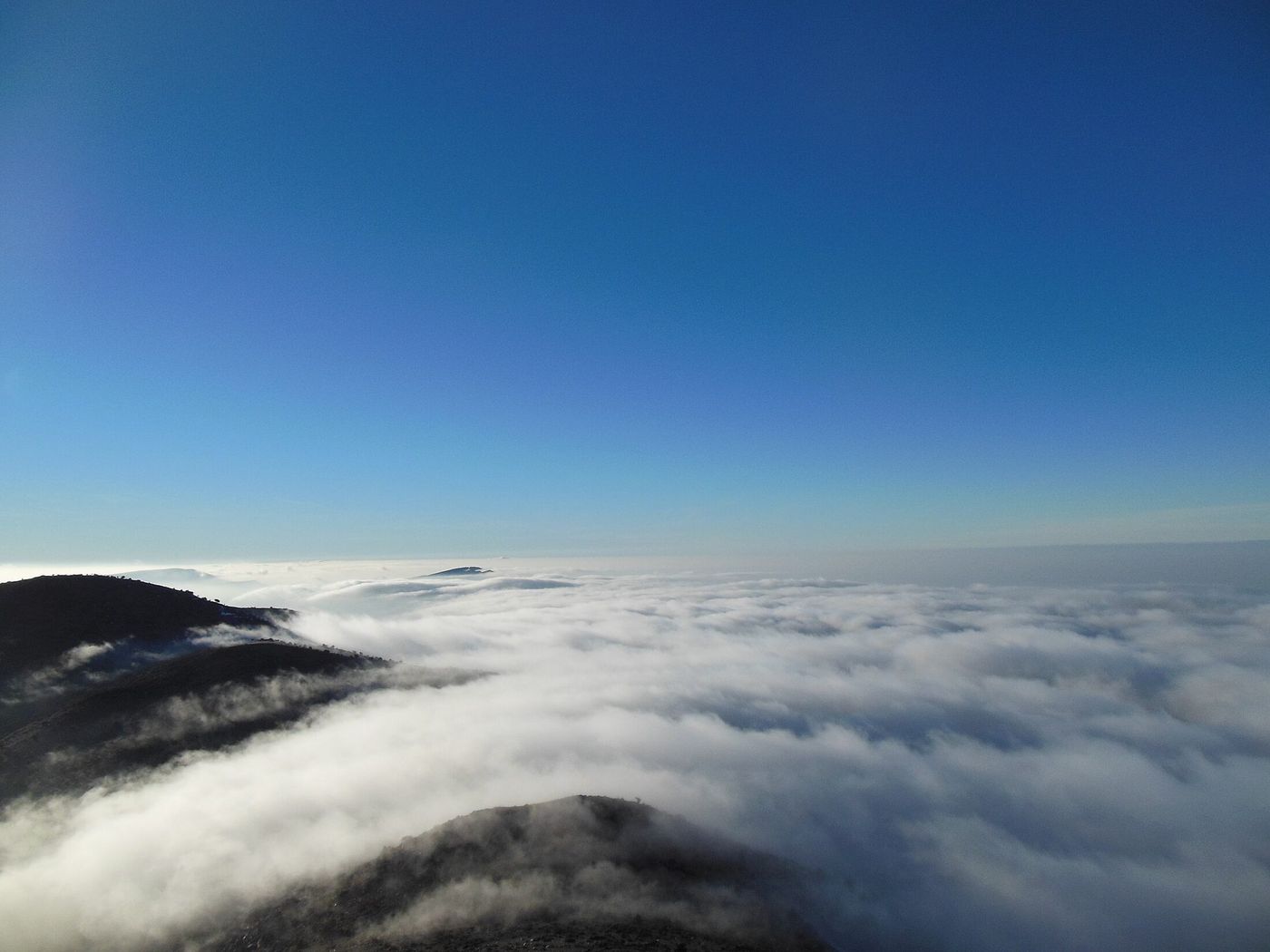A Moroccan ridge above a sea of low cloud