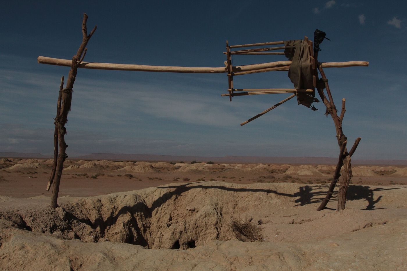 A line of khettara shafts crossing the desert in the Tafilalt, Morocco