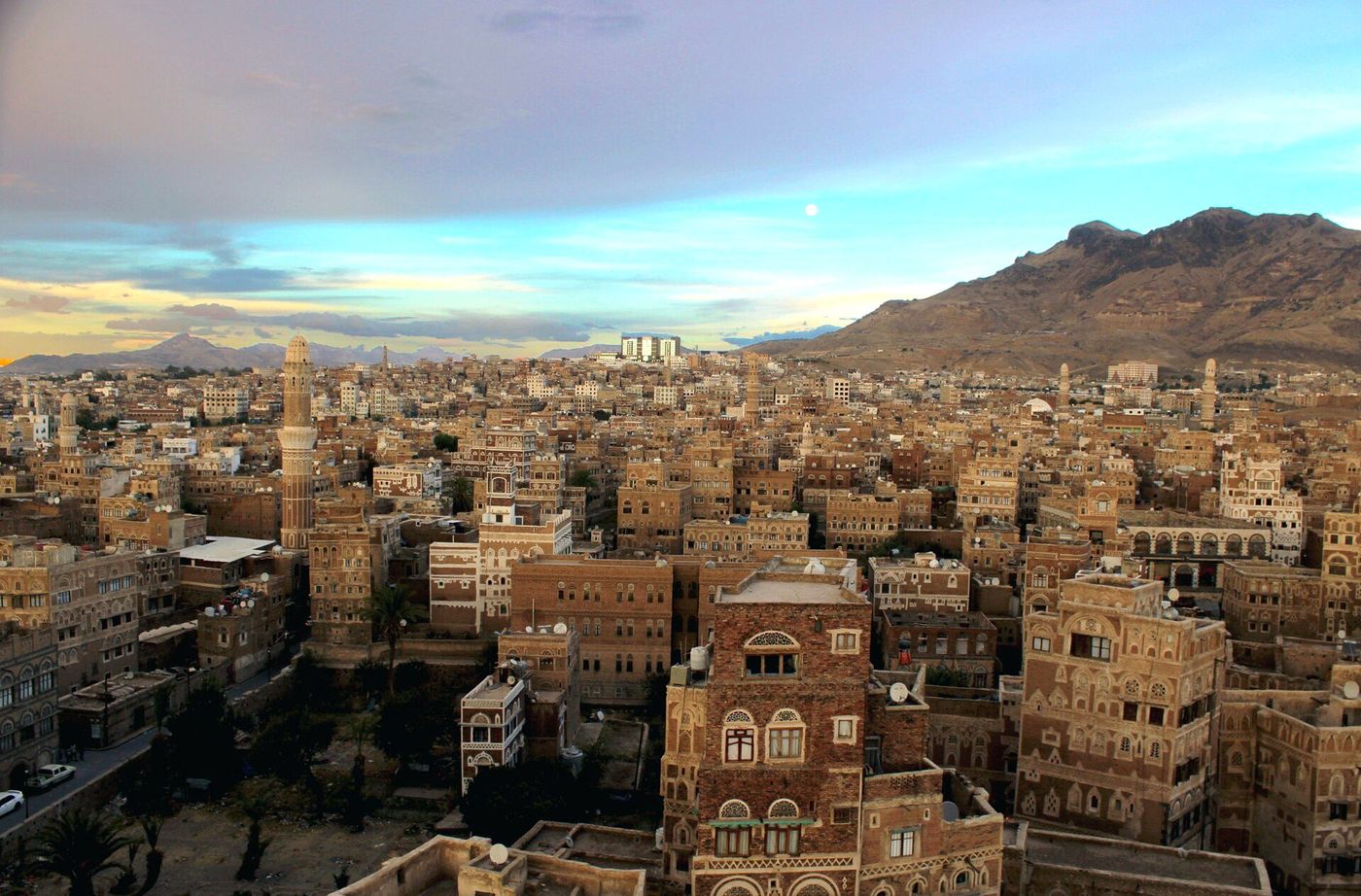 The old city of Sanaa, Yemen, seen across its tower houses in daylight